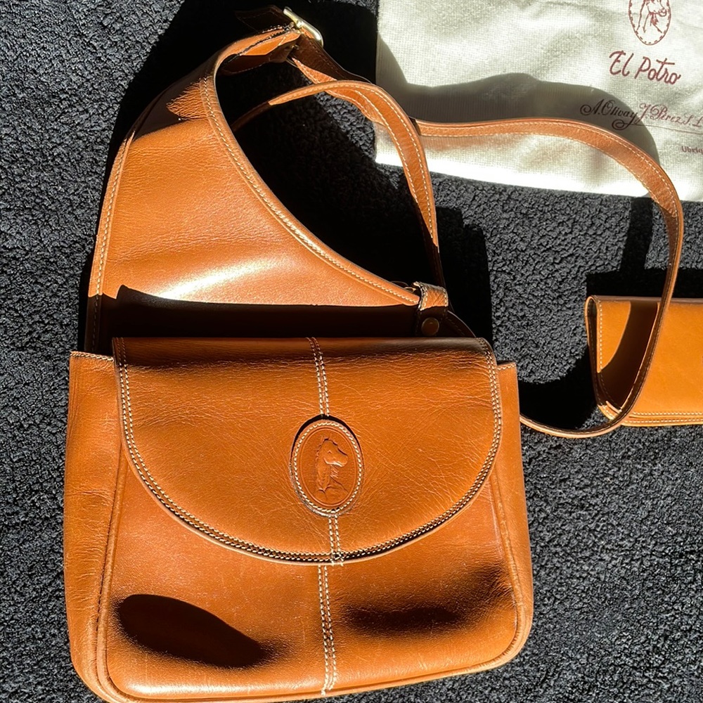 Spanish leather pocketbook, and matching eyeglass case. Purchased in Madrid.